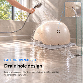 Rinsing the removable CATLINK Open-X Pro drum, with an inset showing its drainage holes